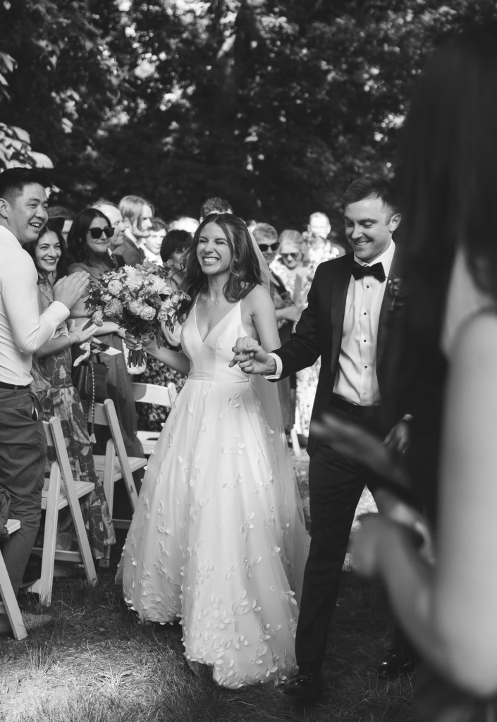 Black and white wedding photo of newlyweds after outdoor ceremony for wedding at Bartram's Garden in Philadelphia, PA. Photographed by South Jersey Philly wedding photographer Madison Neumann Photography.
