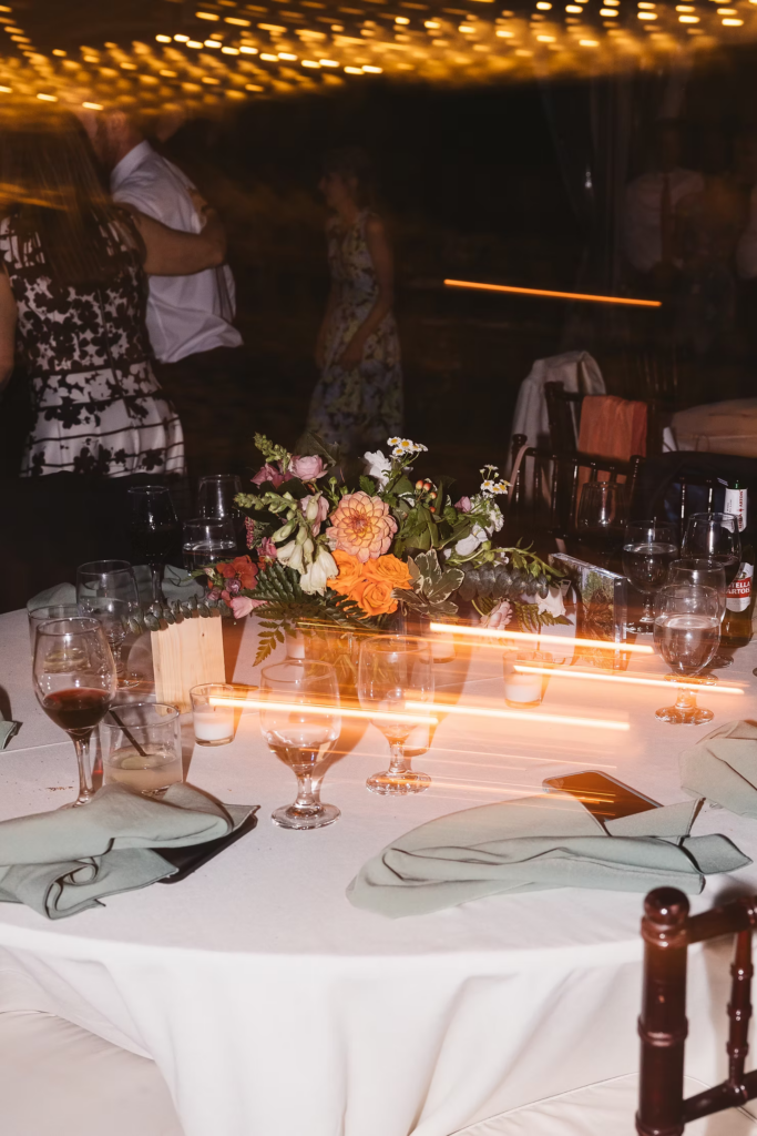 End of the night table decor details for wedding at Bartram's Garden in Philadelphia, PA. Photographed by South Jersey Philly wedding photographer Madison Neumann Photography.