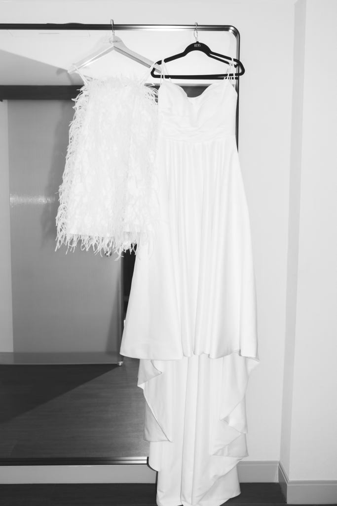 Bridal gown on hanger in getting ready space for wedding day at The Ivy at Ellis Preserve in Newtown Square, PA. Photographed by South Jersey, Pennsylvania region wedding photographer Madison Neumann Photography.