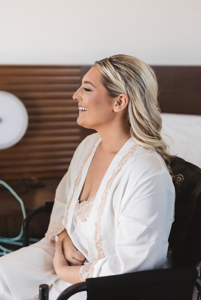 Bride getting hair and makeup done in getting ready room for wedding day at The Ivy at Ellis Preserve in Newtown Square, PA, by Finley Catering. Photographed by New Jersey, Pennsylvania region wedding photographer Madison Neumann Photography.
