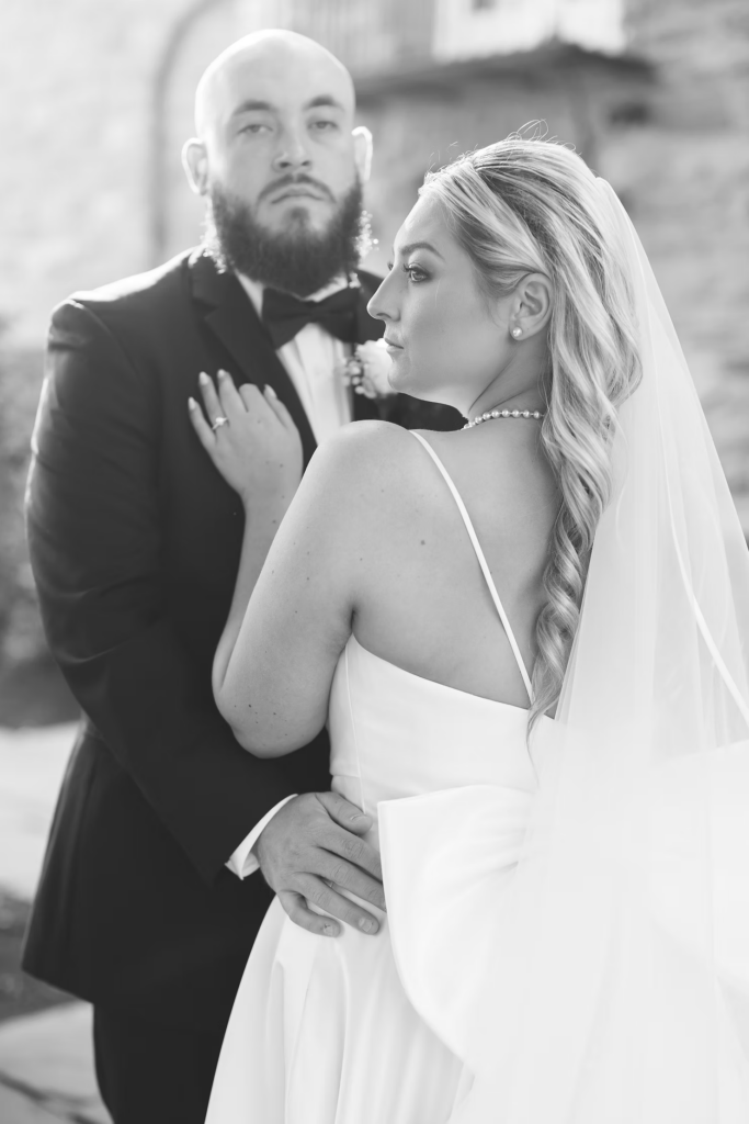 Outdoor black and white couples portrait of bride and groom for wedding day at The Ivy at Ellis Preserve in Newtown Square, Pennsylvania by Finley Catering. Photographed by NJ,PA region wedding photographer Madison Neumann Photography.