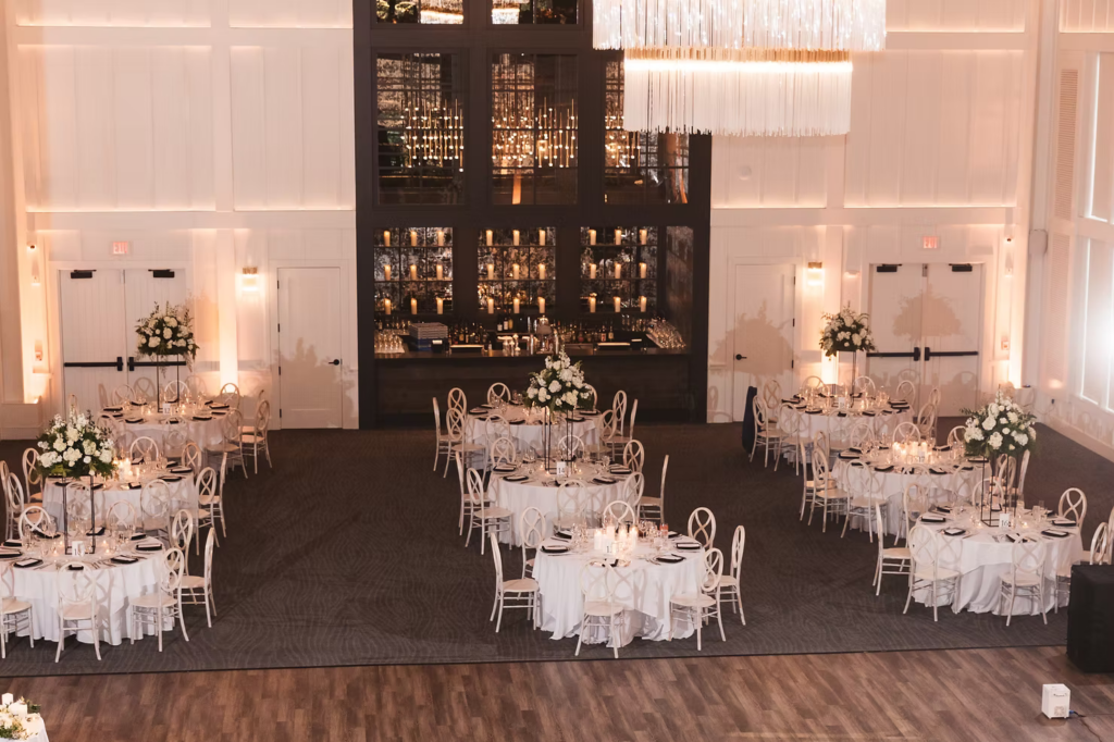 The ballroom at The Ivy at Ellis Preserve by Finley Catering in Newtown Square, PA. Reception room layout and decor details. Photographed by South Jersey, Pennsylvania region wedding photographer Madison Neumann Photography.