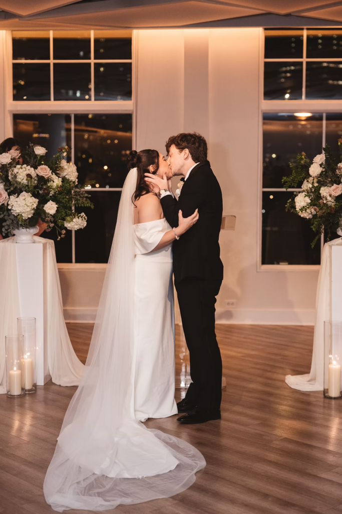 Bride and groom celebrate at the altar at the end of their ceremony. Wedding day at Maritime Parc in Jersey City, NJ. Photographed by South Jersey, Philadelphia based wedding photographer Madison Neumann Photography.