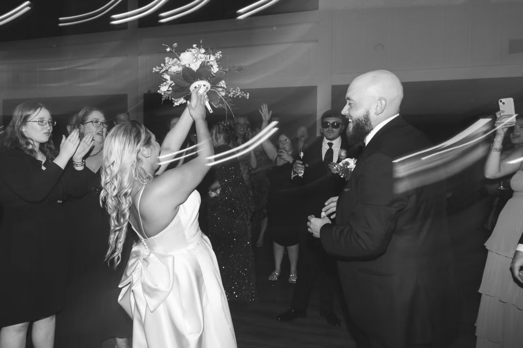 Shutter drag dance floor photograph with light streaks for wedding reception at The Ivy at Ellis Preserve by Finley Catering in Newtown Square, PA. Wedding day photographed by South Jersey, Pennsylvania region wedding photographer Madison Neumann Photography.