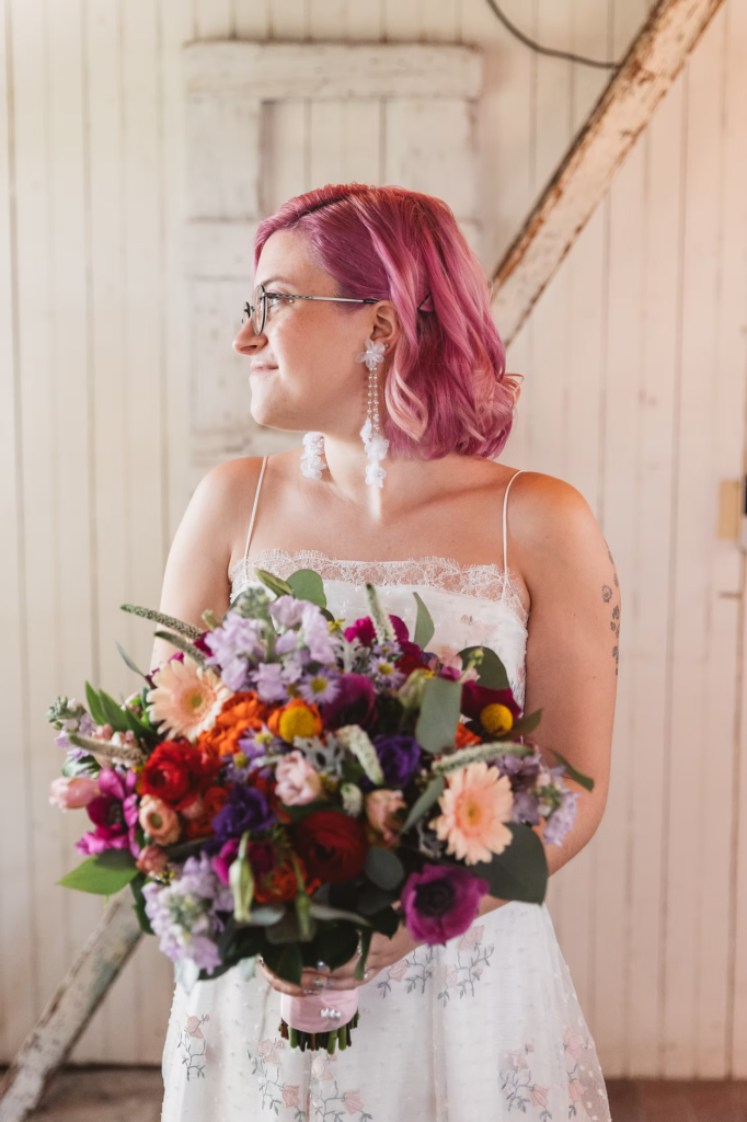 Bride gets ready for her summer garden wedding at terrain in glen mills, PA. photo by Madison Neumann photography.