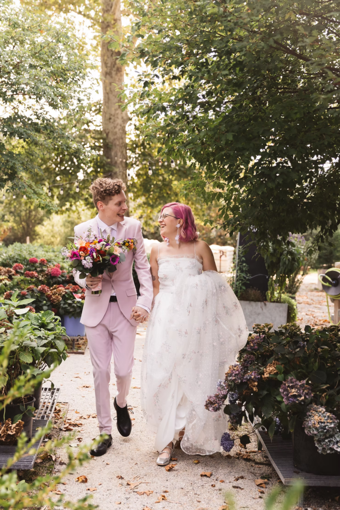 Bride and groom portrait at their colorful garden party wedding at terrain in glen mills, PA. Taken by philly wedding photographer Madison Neumann Photography.