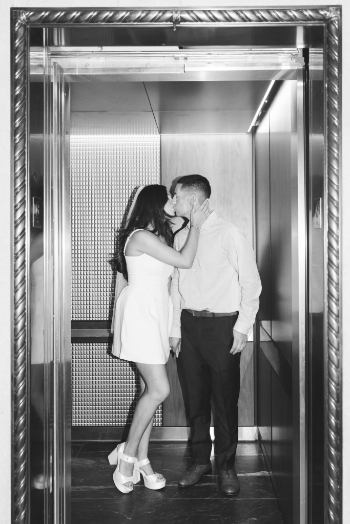 Future bride and groom in elevator for sweet engagement portraits in Philadelphia, PA. Photographed by Philly, South Jersey region wedding photographer Madison Neumann Photography.