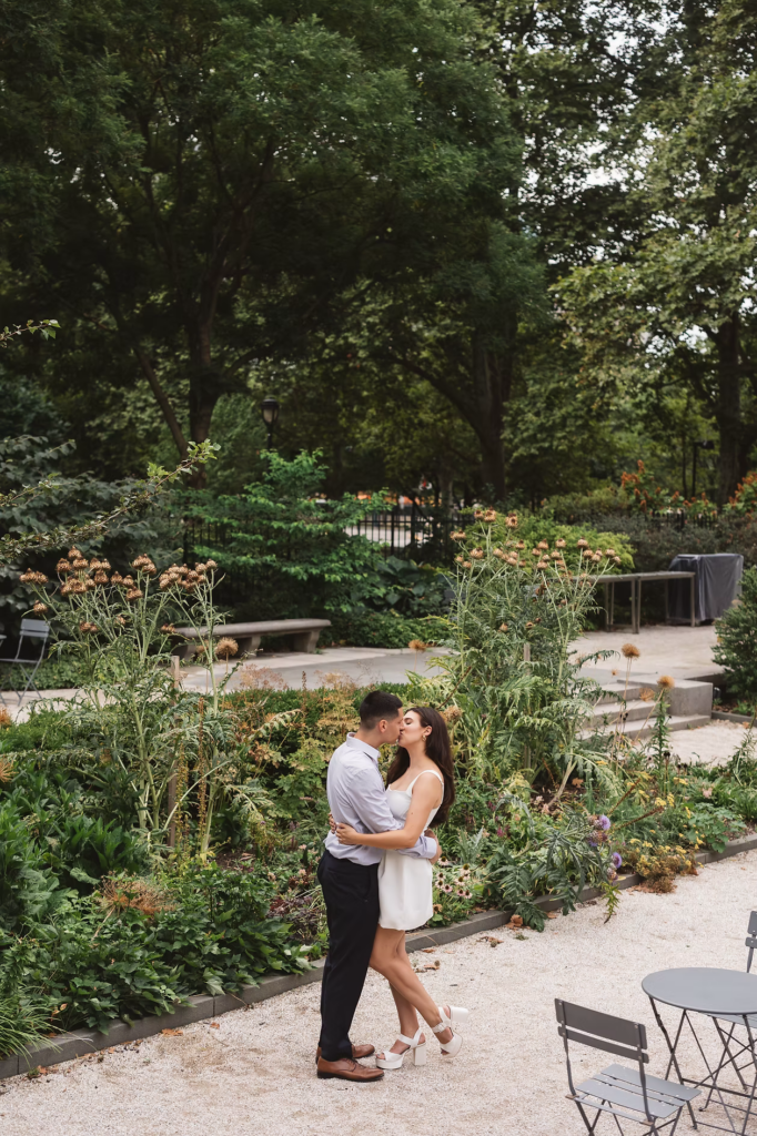 Soon to be bride and groom take engagement session photographs in the garden of The Rodin Museum in Philadelphia, PA. Photographed by Philly, South Jersey based wedding photographer Madison Neumann Photography.