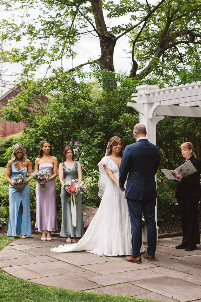 Bride and groom at the altar for Pennsylvania wedding in the Pocono Mountains at The Lodge at Mountain Springs Lake. Photographed by South Jersey Philly Wedding Photographer Madison Neumann Photography.