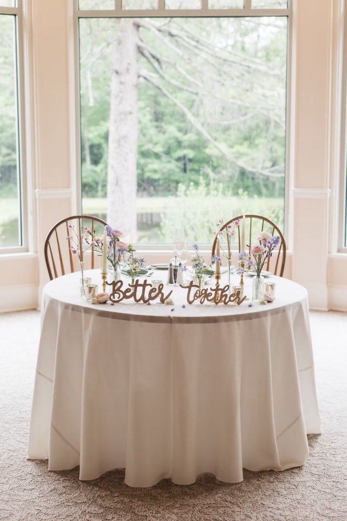 Bride and groom newlywed head table at reception for Pennsylvania wedding in the Pocono Mountains. Photographed by South Jersey Philly Wedding Photographer Madison Neumann Photography.