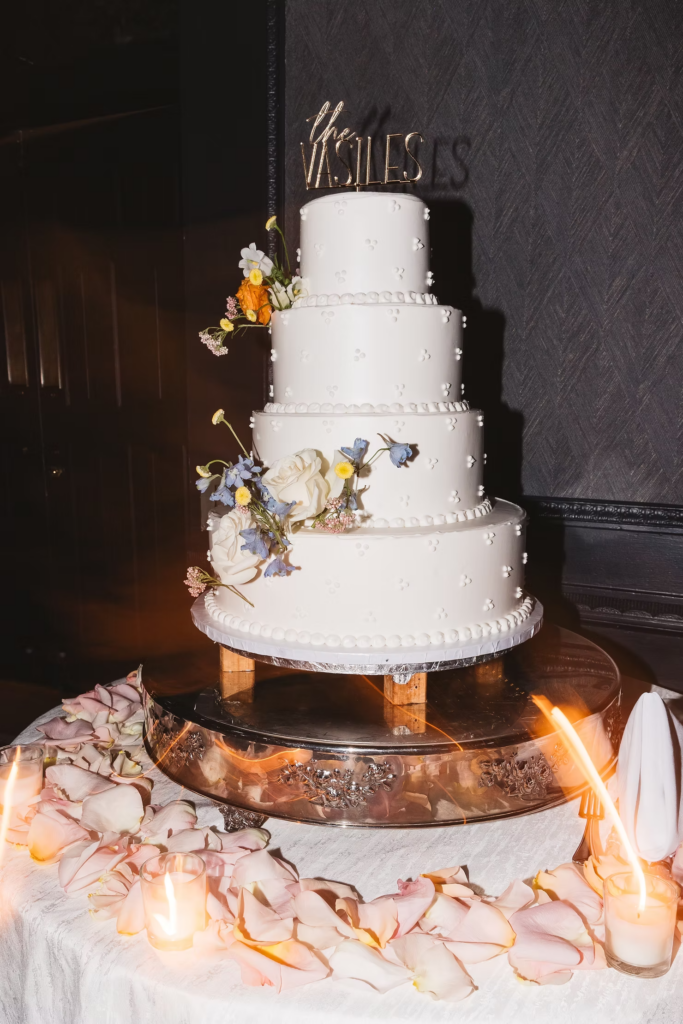 Detail photograph of three tiered wedding cake. Photographed at The Madison Hotel in Morristown, NJ by wedding photographer Madison Neumann Photography.