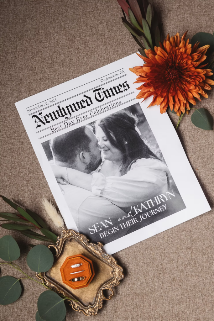 "Newlywed Times," mock newspaper of bride and groom announcing their marriage. Wedding day at Terrain Gardens at DelVal in Doylestown, PA, Photographed by South Jersey, Philly based wedding photographer Madison Neumann Photography.