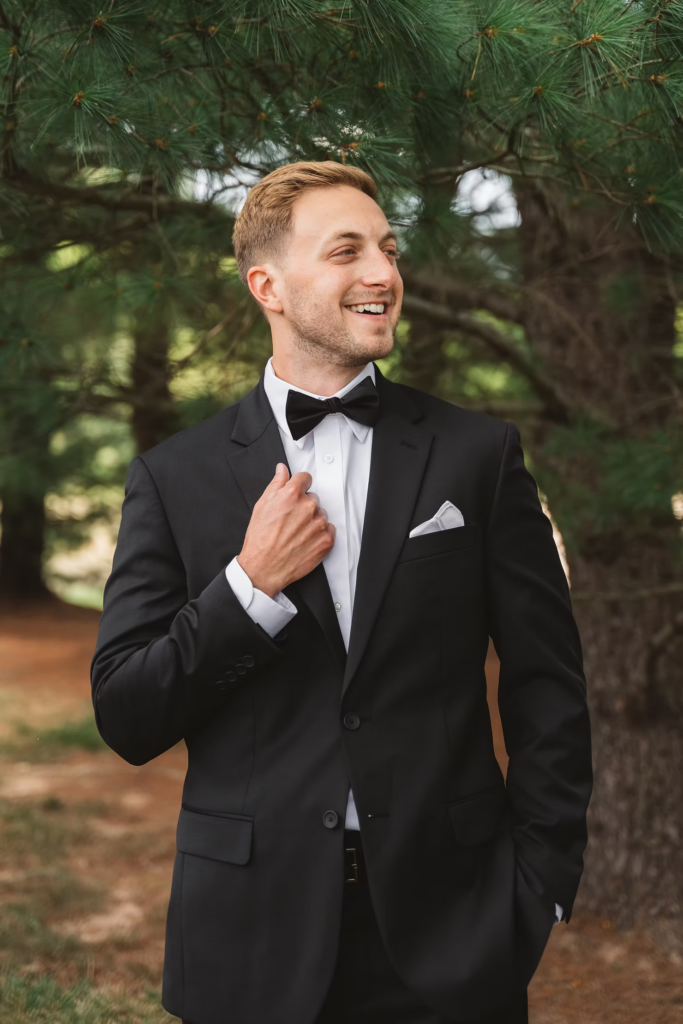 Portrait of groom on wedding day after getting ready for wedding at the historic William Penn Inn in Gwynedd, PA. Photographed by Pennsylvania South Jersey area wedding photographer Madison Neumann Photography.