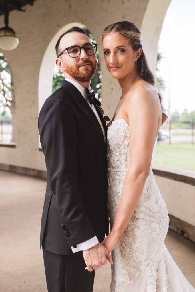 Bride and groom's wedding day portrait outside of their venue. Wedding day at the American Swedish Historical Museum in Philadelphia, PA. Photographed by South Jersey/Philly based wedding photographer Madison Neumann Photography.