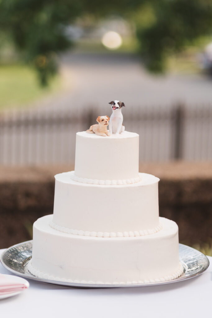 Personalized dog cake toppers on wedding cake. Wedding day at the American Swedish Historical Museum in Philadelphia, PA. Photographed by South Jersey/Philly based wedding photographer Madison Neumann Photography.