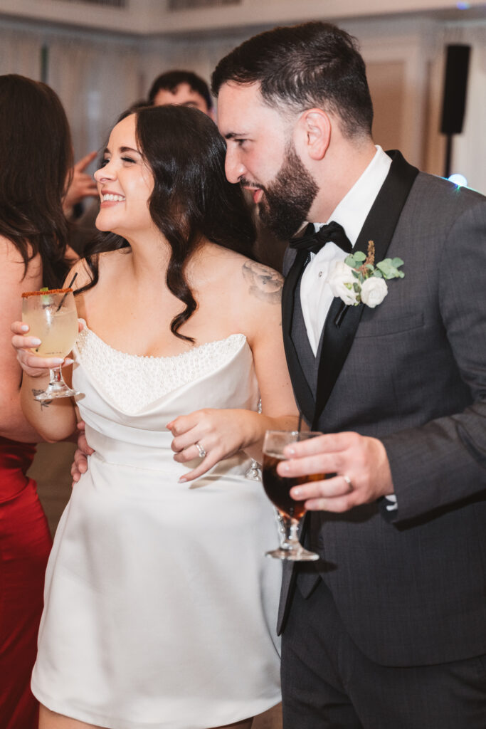 Bride and groom on the dance floor with their guests. Wedding day at Blue Heron Pines Golf Club in Egg Harbor, NJ. Photographed by South Jersey/Philly based wedding photographer Madison Neumann Photography.