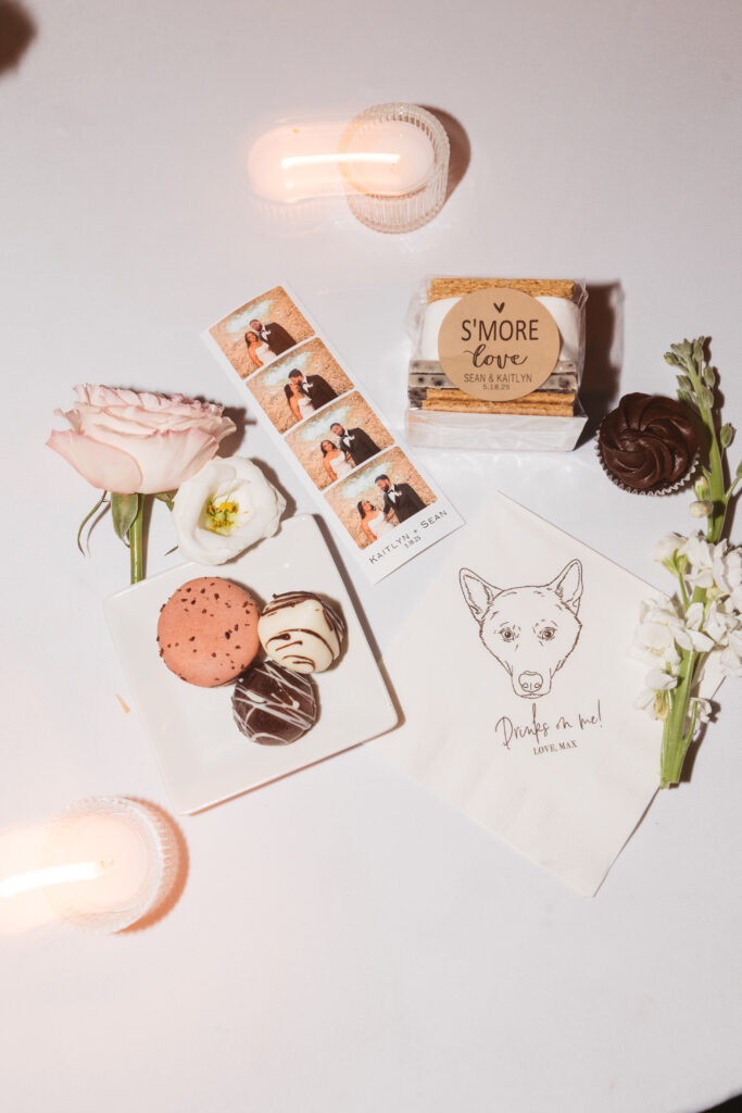 Wedding details including custom napkins, cookies, flowers, and photo strip. Wedding day at Blue Heron Pines Golf Club in Egg Harbor, NJ. Photographed by South Jersey/Philly based wedding photographer Madison Neumann Photography.