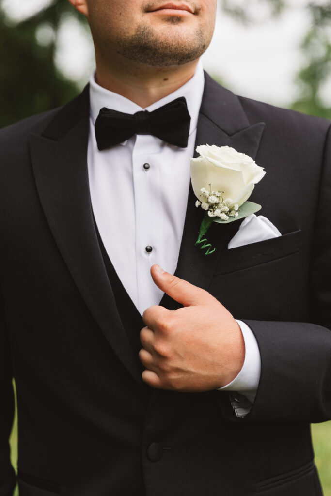 Detail shot of grooms suit photographed by New Jersey and Philadelphia based travel wedding photographer Madison Neumann Photography.