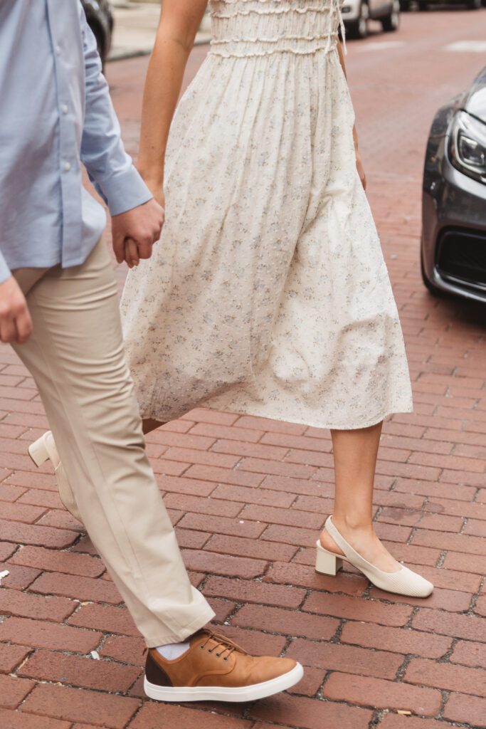 Detail shot of the couple's shoes and legs as they walk across the brick road in old city, Philadelphia, photographed by Philadelphia and New Jersey based travel wedding photographer, Madison Neumann Photography.