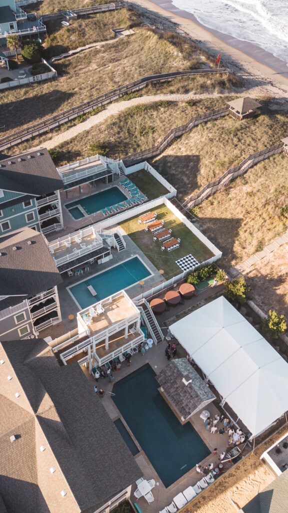 Drone shot of the ceremony and pool from above, photographed by New Jersey and Philadelphia based travel wedding photographer, Madison Neumann Photography.