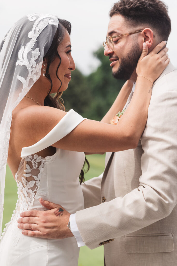 Bride and groom hold one another in an emotional embrace, photographed by Philadelphia and New Jersey based travel wedding photographer, Madison Neumann Photography.