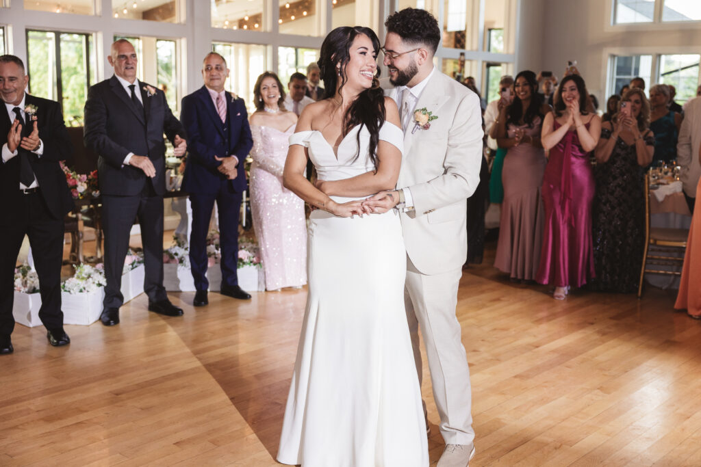 First dance between the bride and groom on the dance floor, photographed by Philadelphia and New Jersey based travel wedding photographer, Madison Neumann Photography.