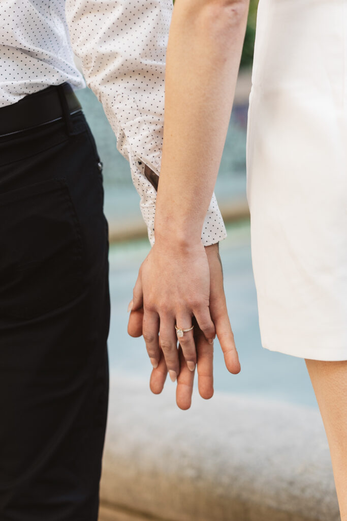 Detail shot of the happy couples hands, showing off the engagement ring, photographed by Philadelphia and New Jersey based travel wedding photographer, Madison Neumann Photography.